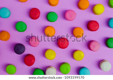 Colorful of mini macaroon cookie dessert food pattern backgrounds above, Top views