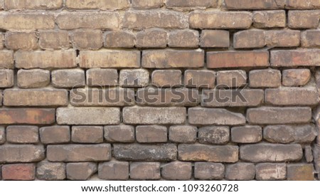Old brick wall made of red brick Crack in the wall