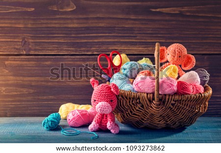 Amigurumi toys on a wooden background