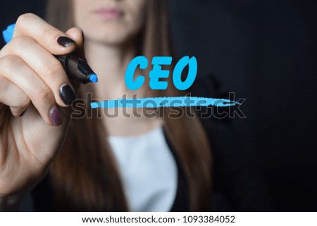 The businessman writes a blue marker inscription:CEO