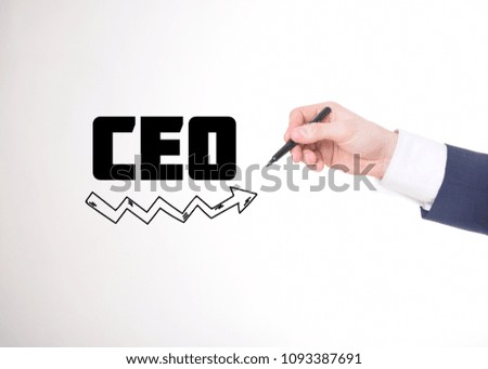 A businessman shows an inscription:CEO