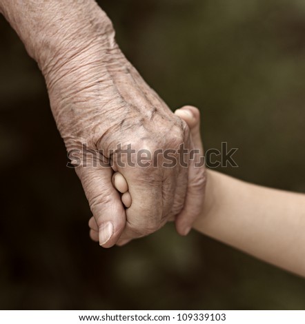hands family grandson and old grandmother