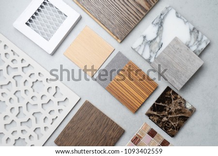 samples of material, wood , on concrete table.Interior design select material for idea. Royalty-Free Stock Photo #1093402559