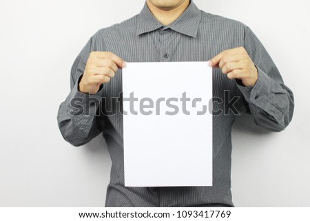 Businessmen Hold Blank white Paper and have copy space to design in your business work.