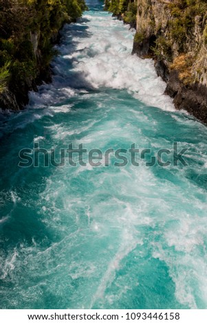 Blue water river and waterfall