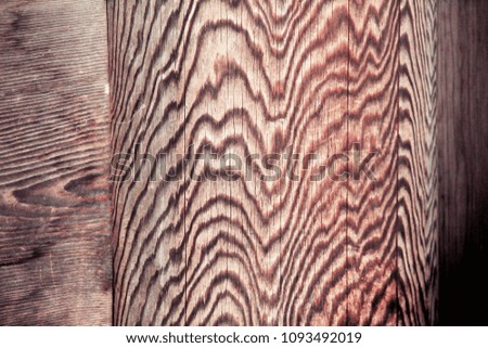 Abstract texture of wooden with wavy lines pattern. blurred image for background or backdrop.