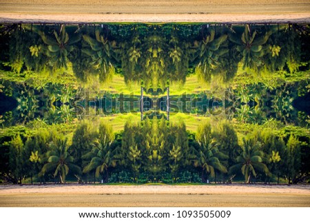Abstract tropical beach pattern - upside down mirrored surreal background texture of a holiday destination with palm trees