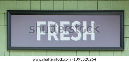 Sign at Market Advertising Fresh Food and Produce