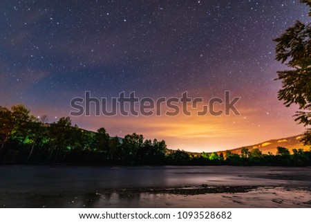 Beautiful Night Sky over Mountain River