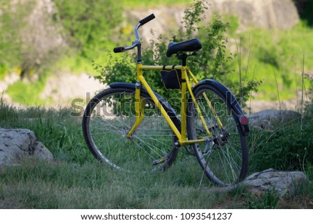 Yellow bike in nature