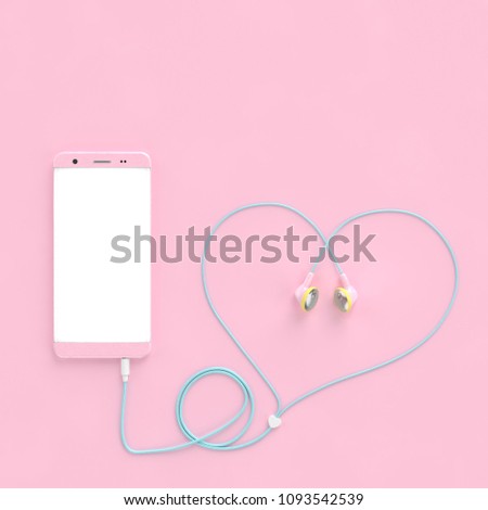 smart phone pastel pink color and earphones wire heart shape on pastel pink. clipping path and copy space for your text, love concept. 3d render