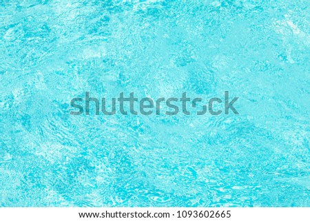 Waving blue water surface. blue clear fresh Water in jacuzzi