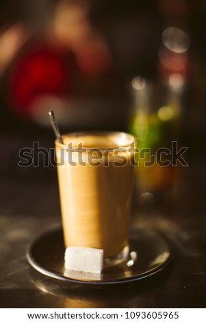Coffee in a glass on a terrace in Tetouan, Morocco.