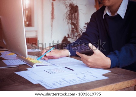 Web designer planning application for mobile phone. Design application development draft sketch drawing online Technology Content.User experience concept.