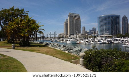 Walkway in San Diego's Embarcadero Marina Park with beautiful view of the San Diego skyline and marina