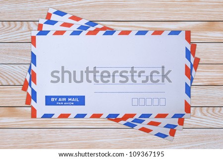 mail envelope on wooden background