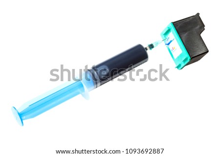 A syringe in the ink supply device of the printer. Close-up. Isolated white background.