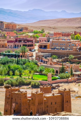 Desert village with Kasbah Ait Ben Haddou near Atlas Mountains, Morocco, Africa Royalty-Free Stock Photo #1093738886
