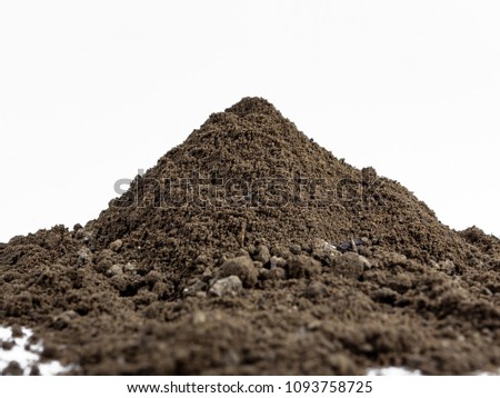 Mound of peat isolated on a white background Royalty-Free Stock Photo #1093758725