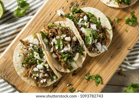 Spicy Homemade Beef Barbacoa Tacos with Cilantro Cheese and Onion