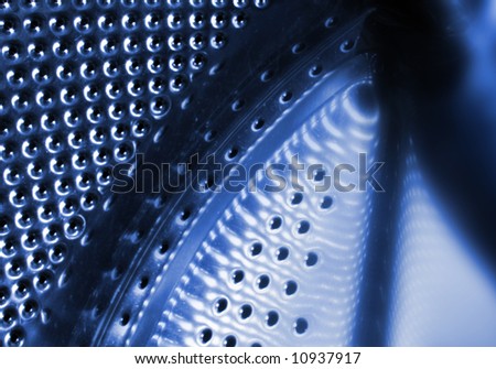 Perforated metallic grid, industrial background