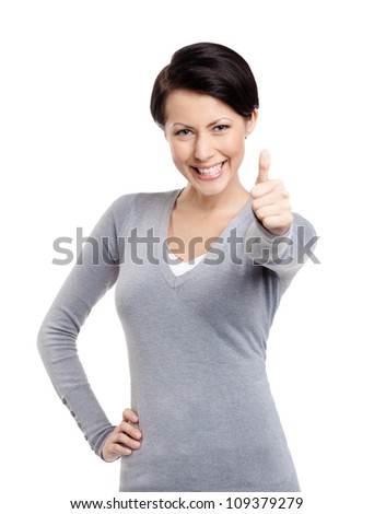 Pretty girl gives thumb up, isolated on white