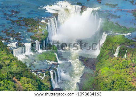 Beautiful aerial view of Iguazu Falls from the helicopter ride, one of the Seven Natural Wonders of the World - Foz do Iguaçu, Brazil Royalty-Free Stock Photo #1093834163