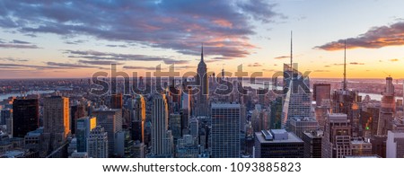 Amazing panorama view of  New York city skyline and skyscraper at sunset. Beautiful night view in Midtown Manhatton. Royalty-Free Stock Photo #1093885823