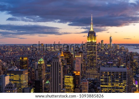 Amazing New York city skyline and skyscraper at sunset. Beautiful night view in Midtown Manhatton.