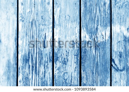 Wooden fence pattern in navy blue color. Abstract background and texture for design.