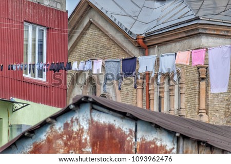 Drying washed laundry on the streets in the courtyard. High, clothes. Georgia, Tbilisi, Batumi, Kutaisi.