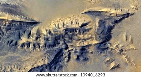 fossil of Pterosaur, abstract photography of the deserts of Africa from the air. aerial view of desert landscapes, Genre: Abstract Naturalism, from the abstract to the figurative, contemporary photo 