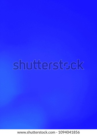 Abstract background of Blue and White color with bokeh defocused lights. Image is good to use as an Light Overlay. 