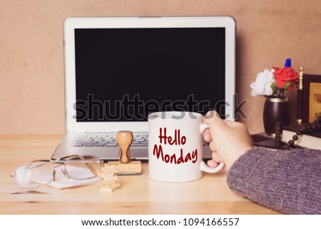 muslim woman drinking a coffee and hello monday concept