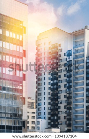 High-rise building on the background of Sunny sky