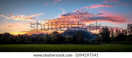 Festung Hohensalzburg in Salzburg under an epic sunset-sky
