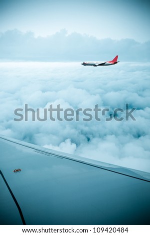 airfoil and stratosphere,aircraft in the sky Royalty-Free Stock Photo #109420484