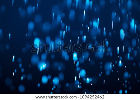 Abstract blue bokeh of blurry lights background