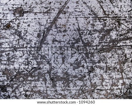 Stock macro photo of the texture of worn, scratched metal.  Useful for style layers and abstract masks.