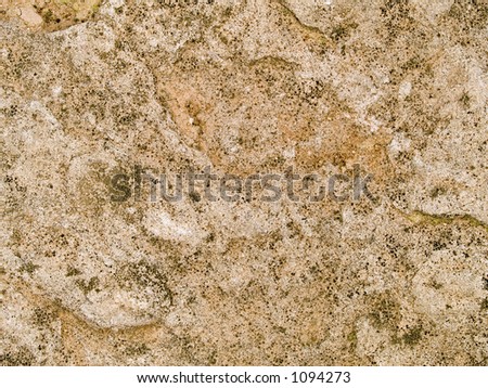 Stock macro photo of the texture of mottled rock.  Useful for abstract backgrounds or layer masks.
