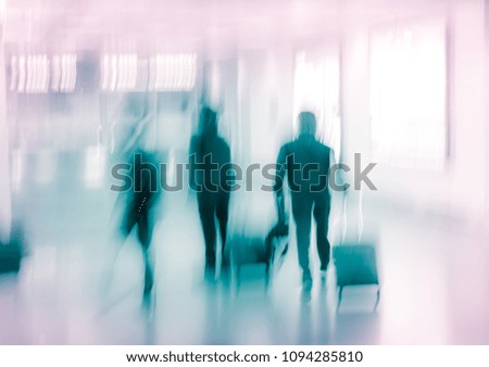 Walking people , Blur background with a airport hall blur effect, unrecognized color image.