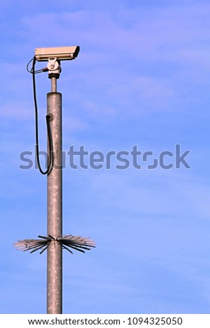 security camera on a metal pole no people stock photo 