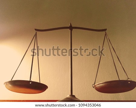 Vintage scales on wooden table,Justice concept