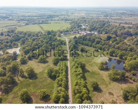 Aerial Drone Field Farmer Landscape Dunham Massey Trees Royalty-Free Stock Photo #1094373971