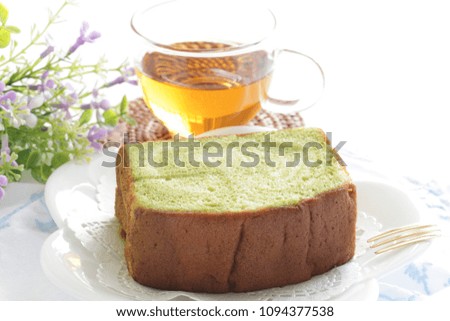 Piece of green tea marble cake and English Earl grey tea