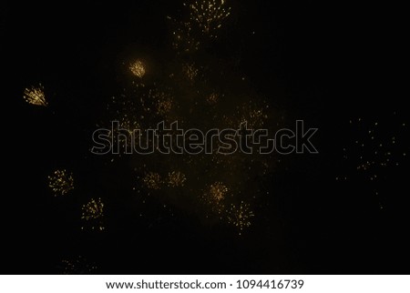 various fireworks at night from house roof