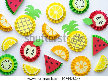 Fruit made of paper. White background. There's room for writing.Tropics. Flat lay.