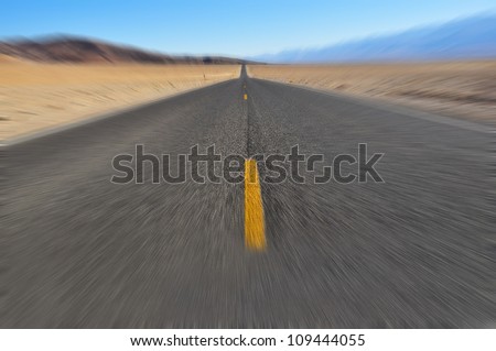 Road that goes to the horizon with motion blur applied