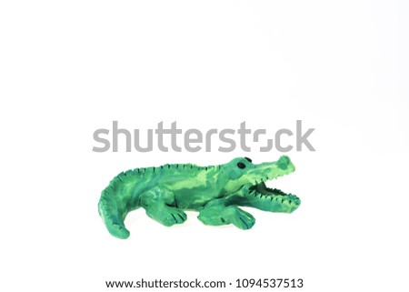 Plasticine artwork. Handmade crocodile. 
