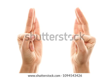 Vayu Mudra, yoga for fingers, ritual gesture in Buddhism. Isolated on white background Royalty-Free Stock Photo #1094543426